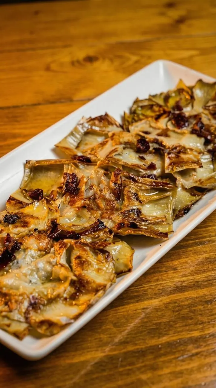 Alcachofas a la plancha con jamón